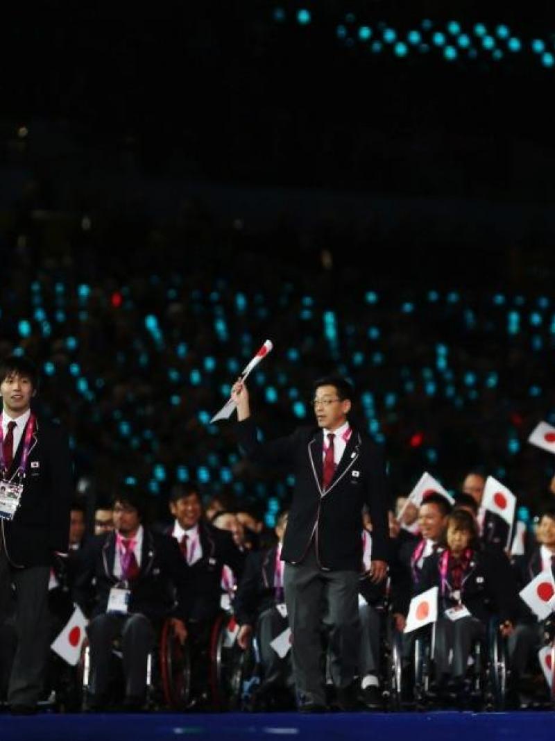 Swimmer Keiichi Kimura of Japan carries the flag during the Opening Ceremony of the London 2012 Paralympic Games.
