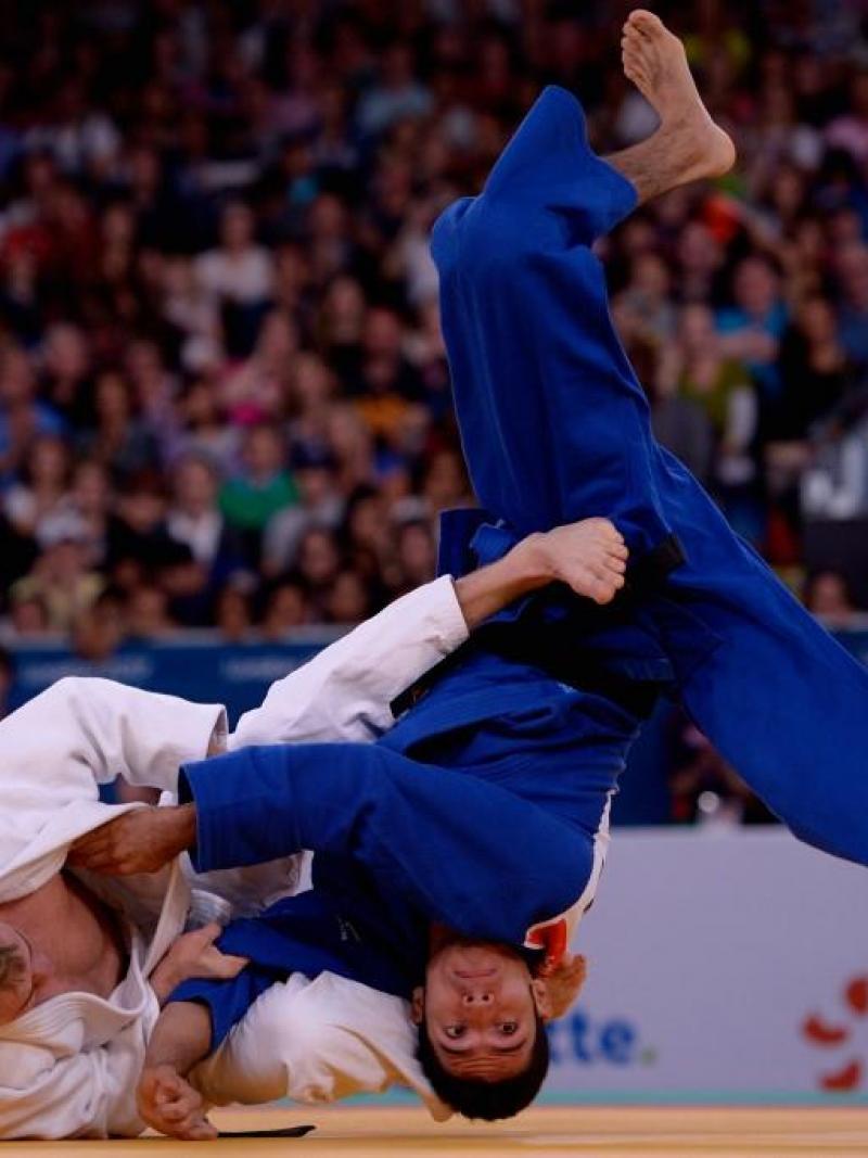 Eduardo Avila Sanchez of Mexico and Dmytro Solovey of Ukraine compete in the Men's 73kg Judo Semifinals at the London 2012 Paralympic Games.