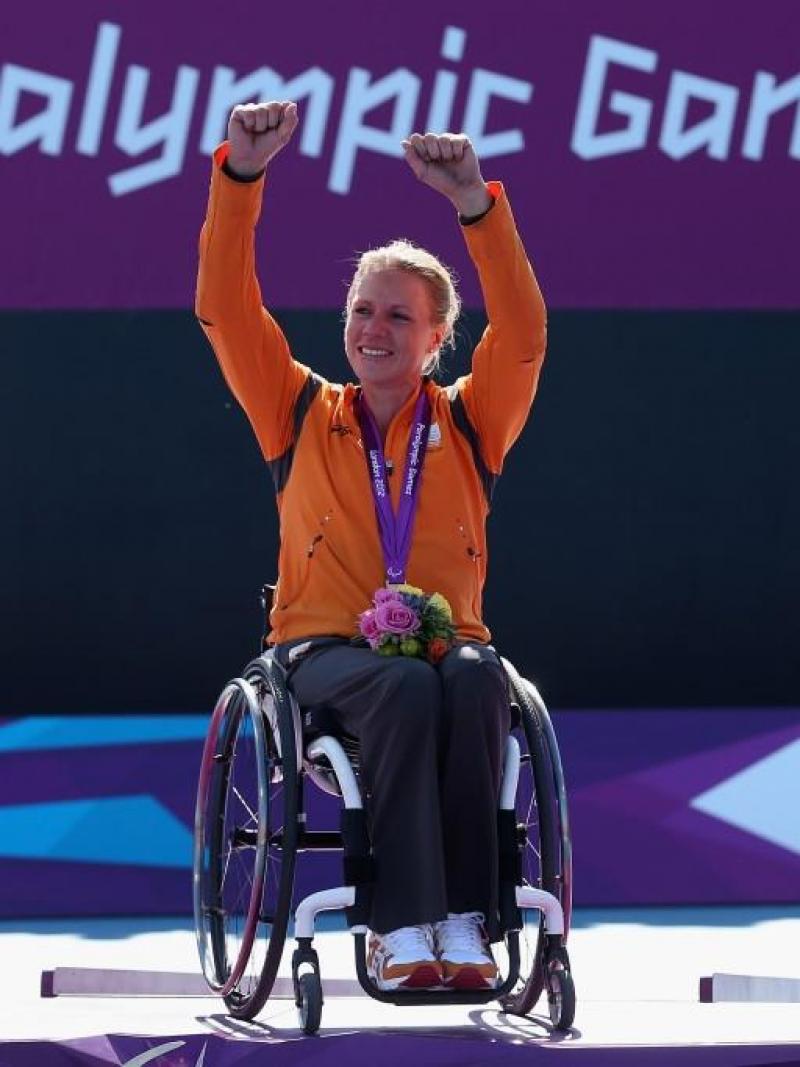 Esther Vergeer of Netherlands with her gold medal after defeating Aniek Van Koot of Netherlands in the final of the Women's singles match in the Wheelchair Tennis at the London 2012 Paralympic Games.