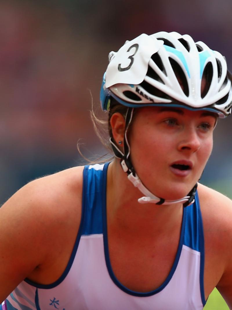 A wheelchair racer focuses