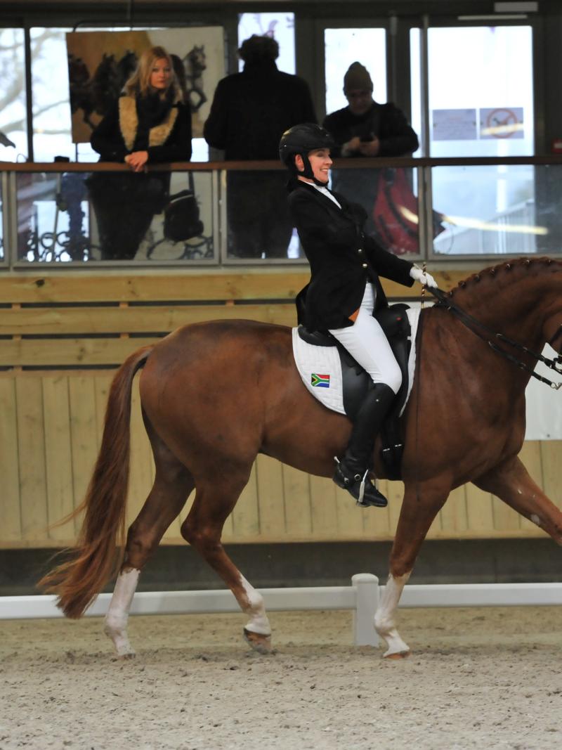 Woman riding a horse