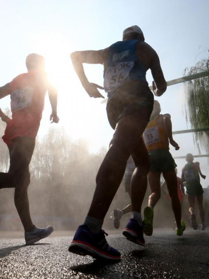 Runners enter a cooling station