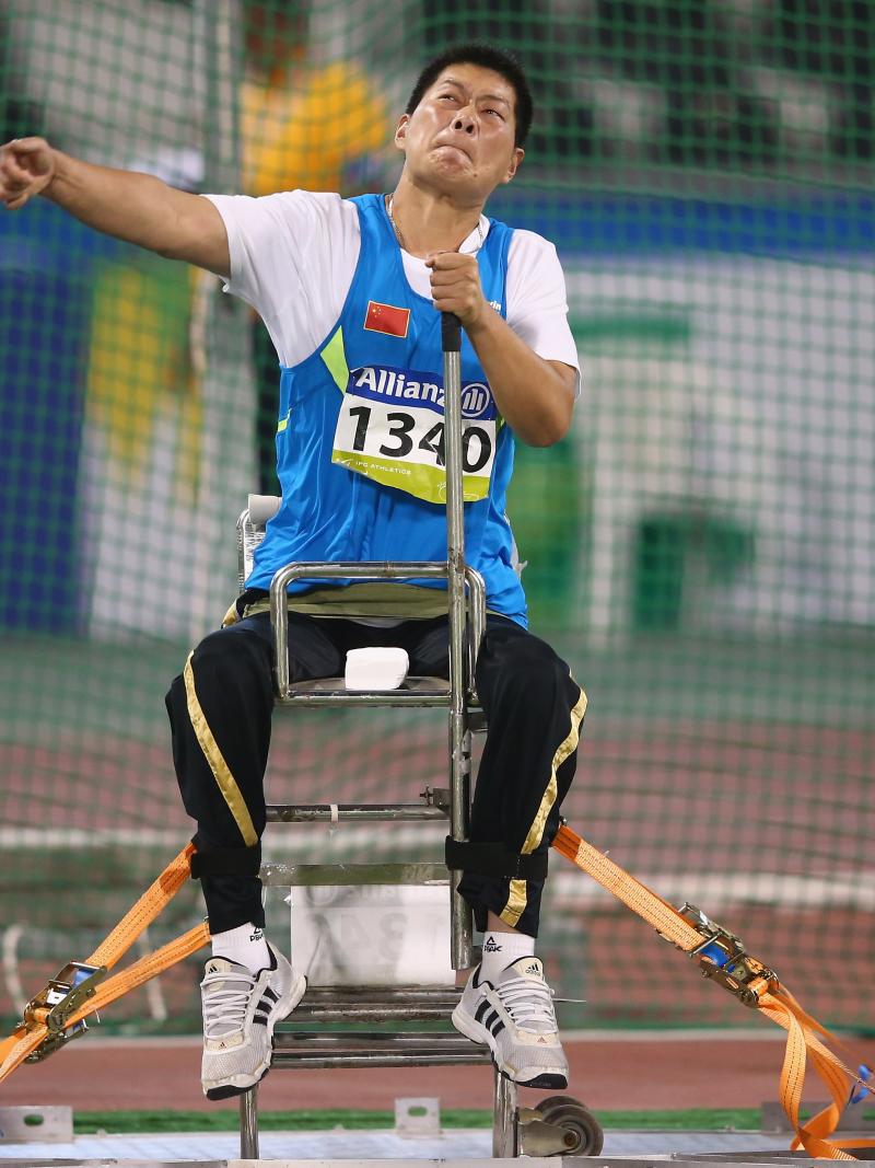 Chian's Liwan Yang competes in the women's discus F55 final during the 2015 IPC Athletics World Championships in Doha, Qatar.