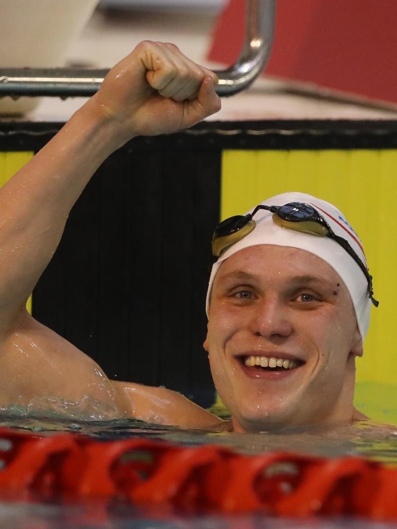 Great Britain's Aaron Moores celebrates breaking the world record in the men's 100m breaststroke final at the 2016 British Para-Swimming International Meet.