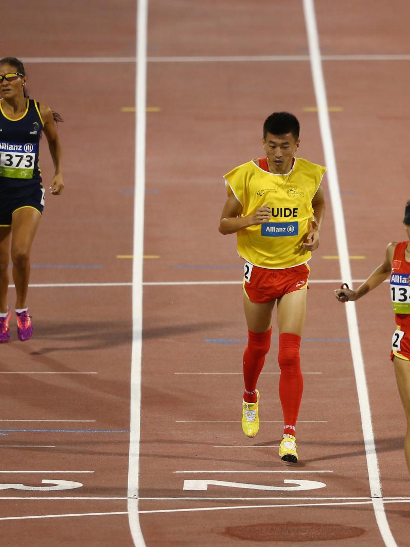China's Jin Zheng celebrates winning the women's 1500m T11 final during the 2015 IPC Athletics World Championships.