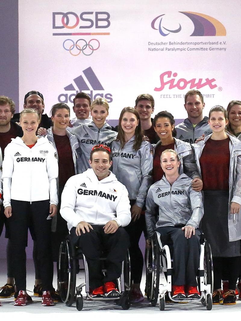 Group of young people pose for photo