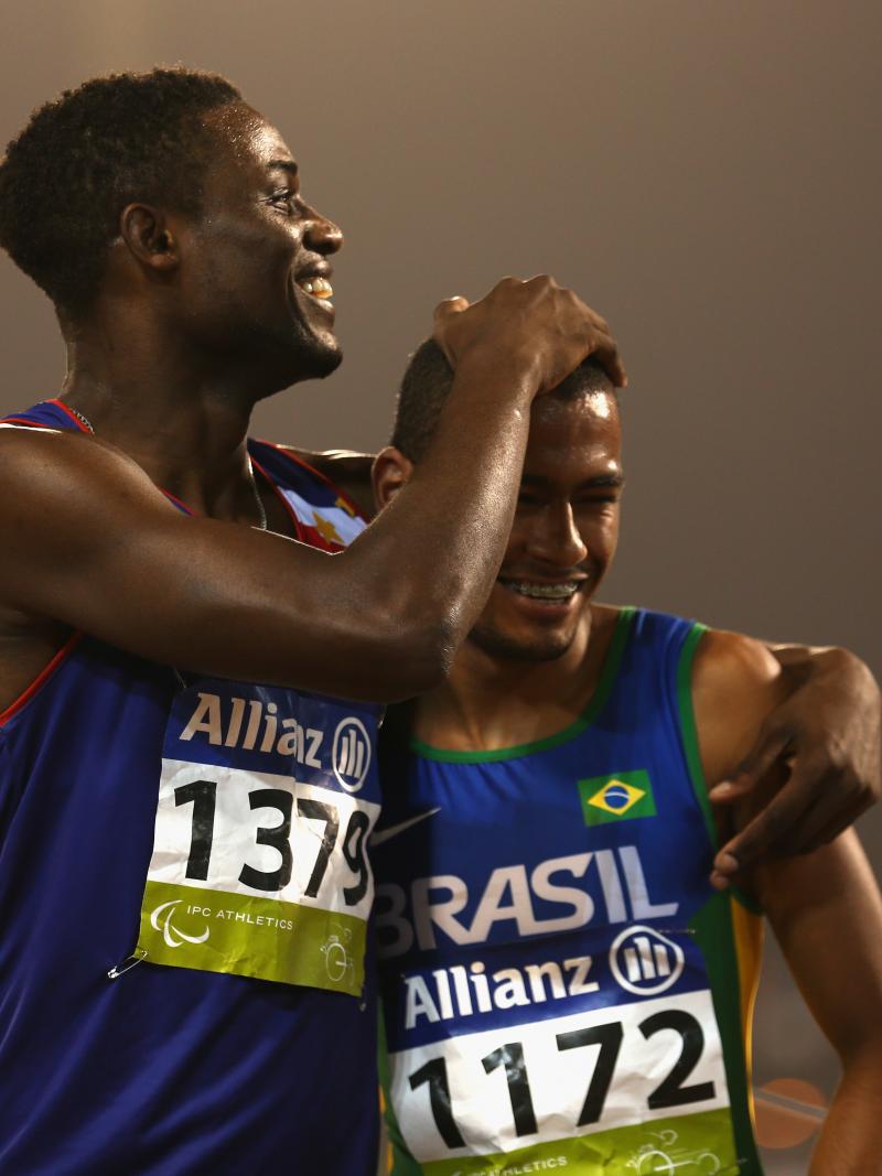 Brazil's Daniel Martins celebrates winning the men's 400m T20 final with Graclino Tavares Barbosa of Cape Verde during the 2015 IPC Athletics World Championships.