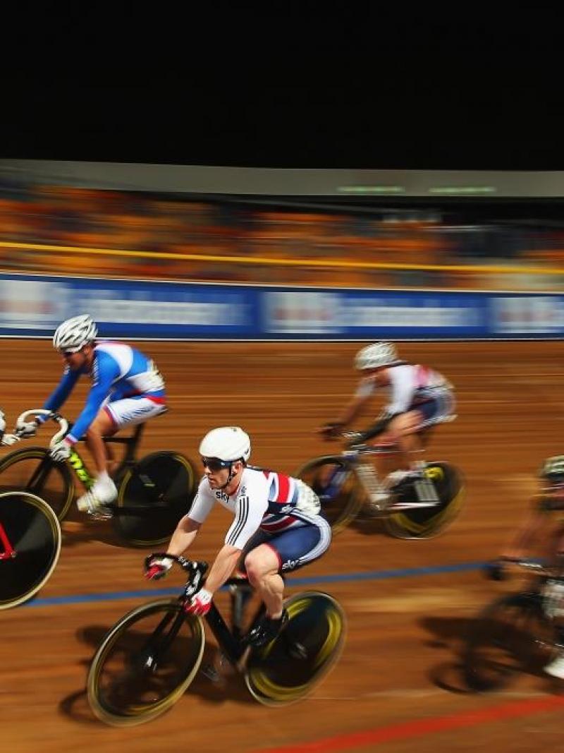 A group of cyclists compete in the Men's C4-5 Scratch race at the UCI Para-cycling Track World Championships in Apeldoorn, Netherlands.