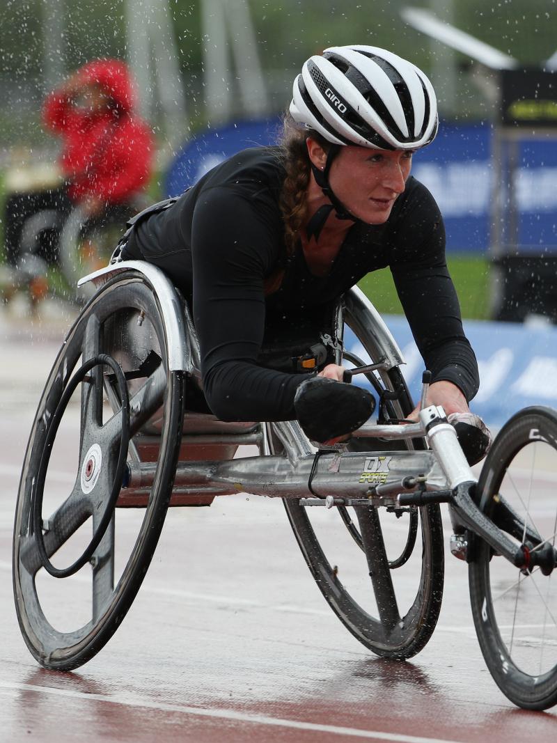 Tatyana Mcfadden competes in torrential rain at the 2016 IPC Athletics Grand Prix in Nottwil, Switzerland.