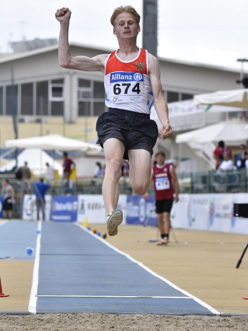 Man in the air during a lung jump