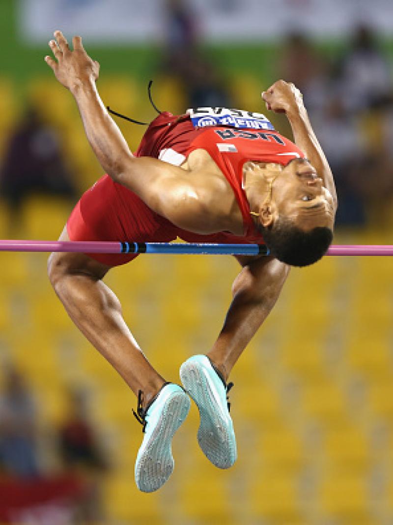 Man doing high jump