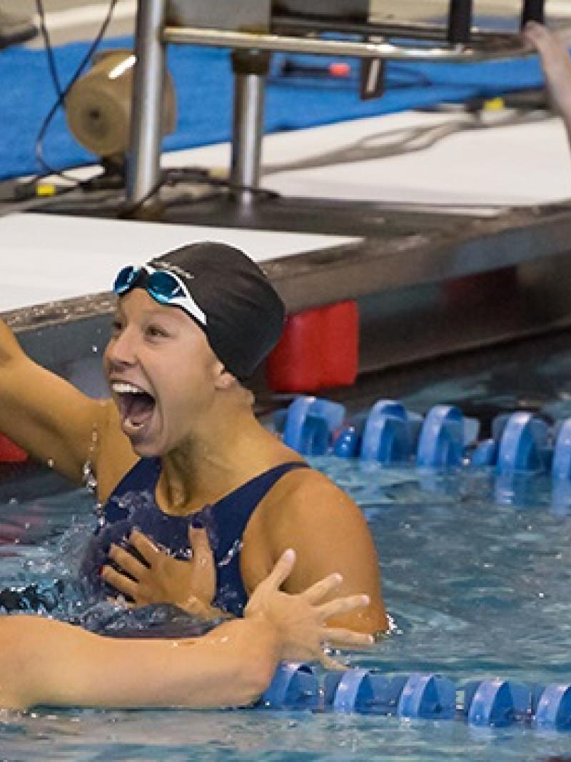 A Para swimmer celebrates a new world record