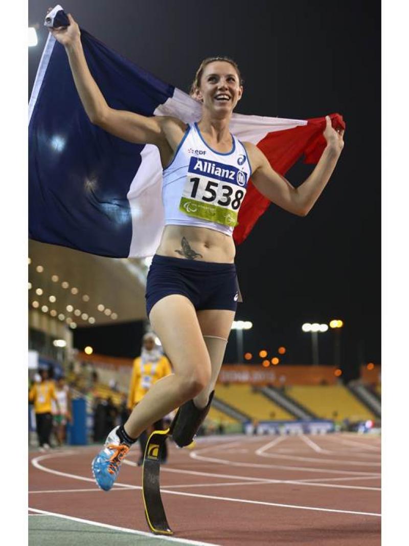 Marie-Amelie Le Fur of France celebrates winning the women's 400m T44 final during the Evening Session at the IPC Athletics World Championships in Doha, Qatar.