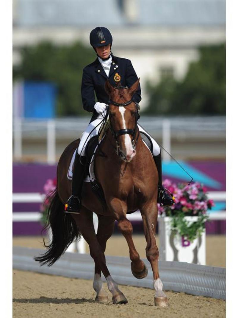 Michele George of Belgium rides Rainman to win Gold during the Equestrian Dressage Individual Freestyle Test - Grade IV at the London 2012 Paralympic Games.