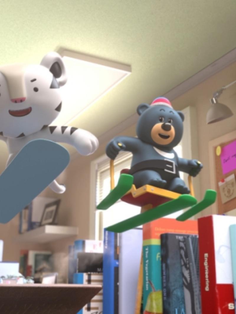 PyeongChang 2018 mascot white tiger on  a snowbaord and Asiatic black bear on a sit-ski.