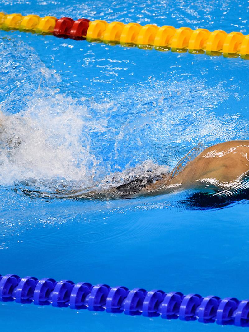 Lichao Wang CHN competes in Heat 2 of the Men's 50m Butterfly S6 at the Olympic Aquatics Stadium.