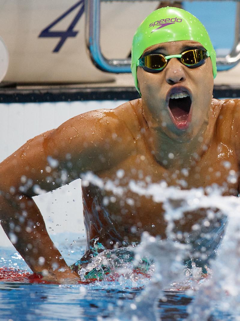Carlos Serrano Zarate COL takes the Gold Medal in a new World Record time in the Men's 100m Breaststroke.