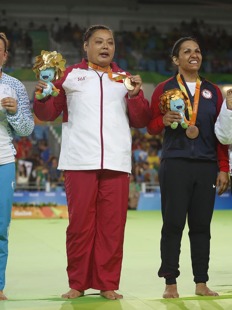The four medallists from the women's +70kg judo category on the podium at Rio 2016. 