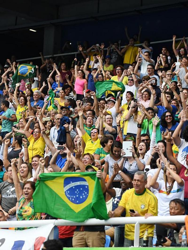 Spectators cheer during the Rio 2016 Paralympic Games on Saturday