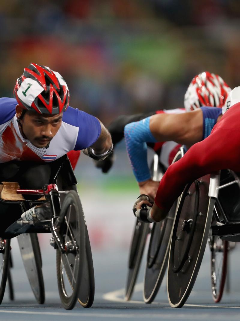 Prawat Wahoram of Thailand and Marcel Hug of Switzerland lead the pack in heat one of the men's 5000m meter T54 at the Rio 2016 Paralympic Games.