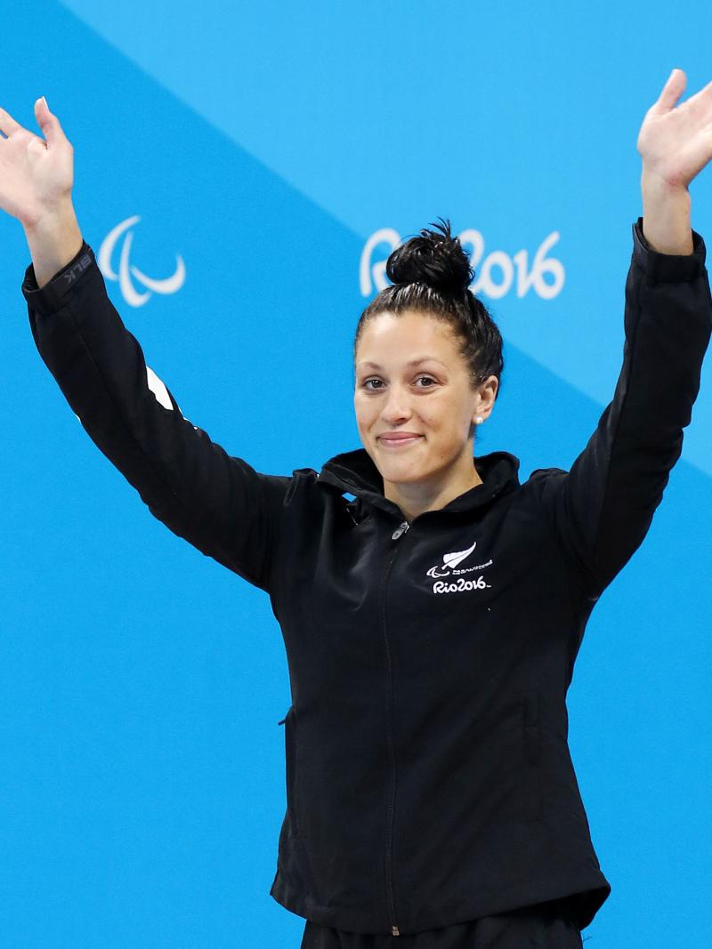 Sophie Pascoe of New Zealand stands on the podium after winning a gold medal in the women's 100m Backstroke S10 final at the Rio 2016 Paralympic Games.