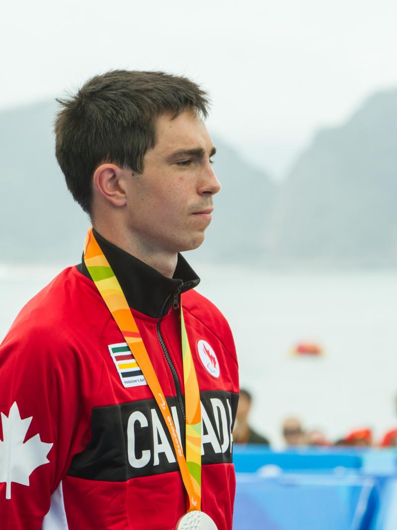 a man stands on a podium