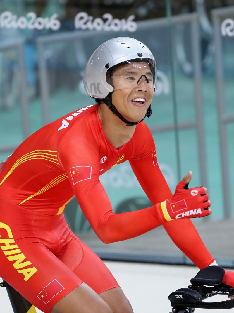 Gold medalist Zhangyu Li of China celebrates after competing in the men's 3km C1 Pursuit Final at Rio 2016 Paralympics at Rio Olympic Velodrome.