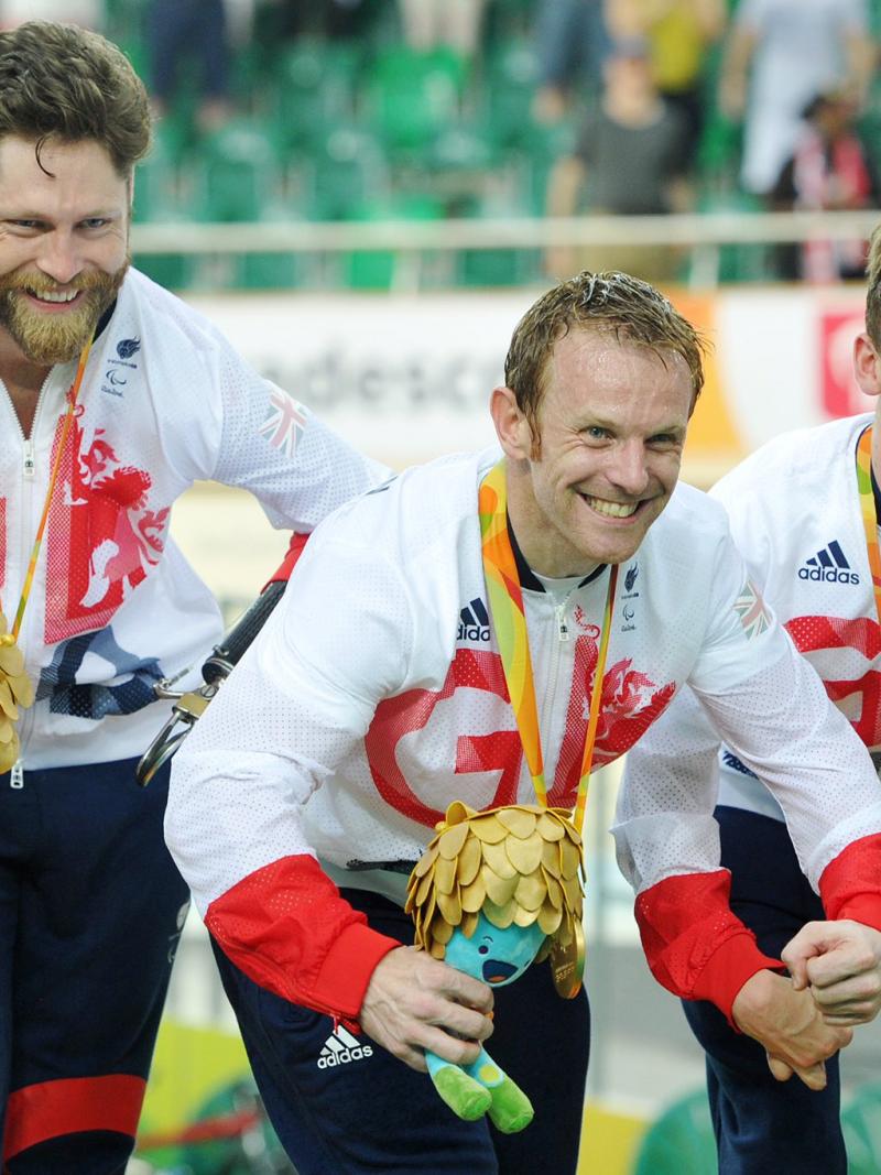 Louis Rolfe, Jon-Allan Butterworth and Jody Cundy celebrate gold medal for team GB