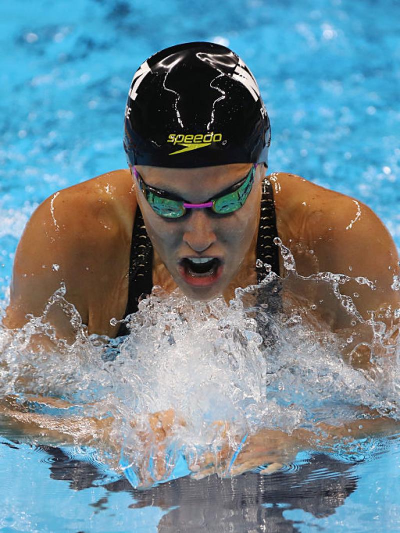 Close up of swimmer doing breast stroke