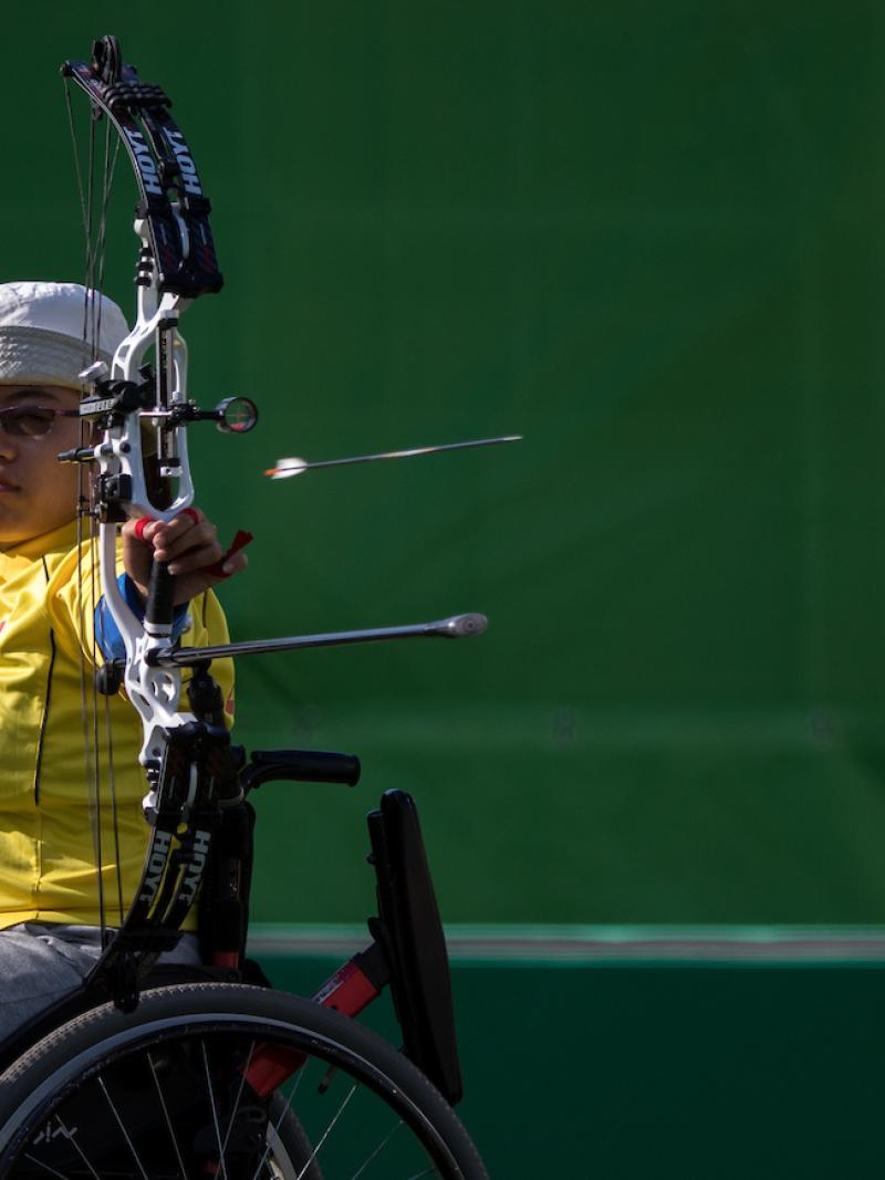 Xinliang Ai CHN competing against Turkey in the Mixed Team Compound Open Archery semi-final match at the Sambodromo