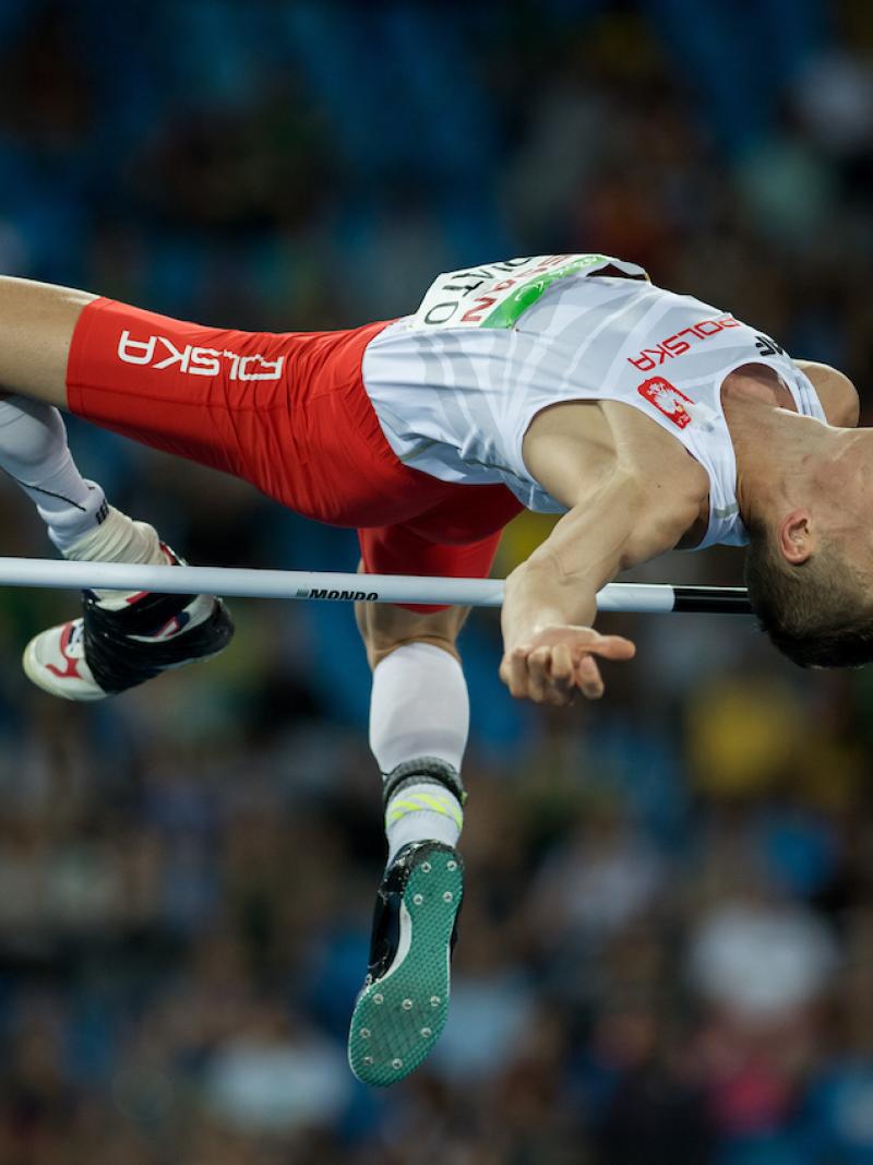 Gold Medallist Maciej Lepiato POL competes in the Men's High Jump - T44 Final