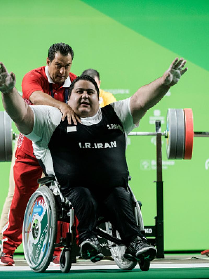 Siamand Rahman of Iran celebrates his new world record on the Powerlifting - Men's +107kg Group A at Riocentro Pavillon 2 at the Rio 2016 Paralympic Games.