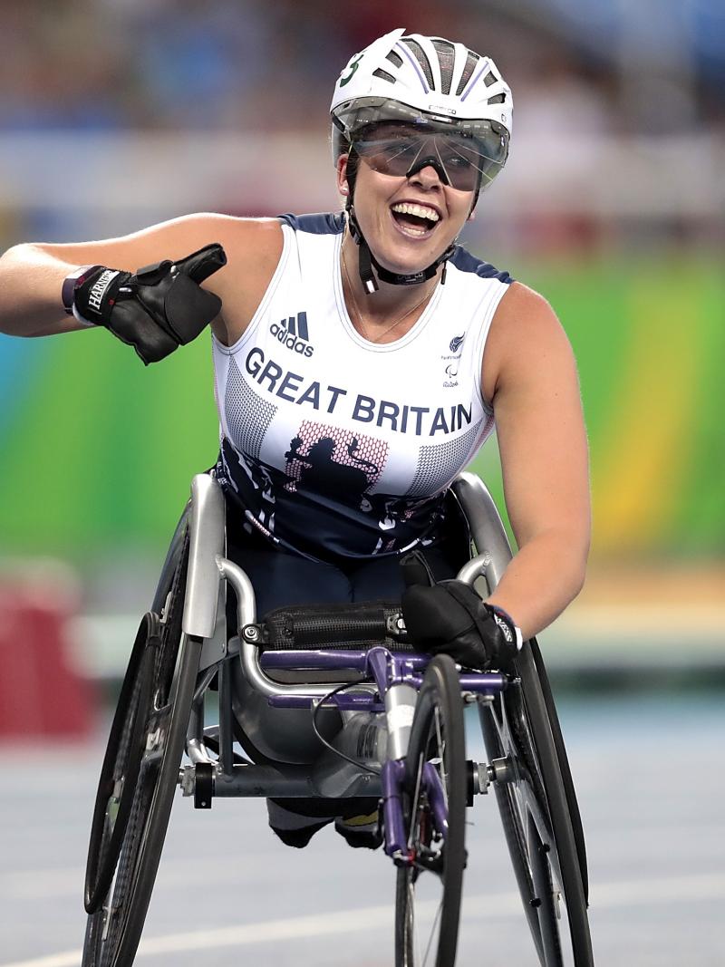 Hannah Cockroft of Great Britain celebrates the victory in the Women's 400m T34 final at Olympic Stadium on day 7 of the Rio 2016 Paralympic Games.