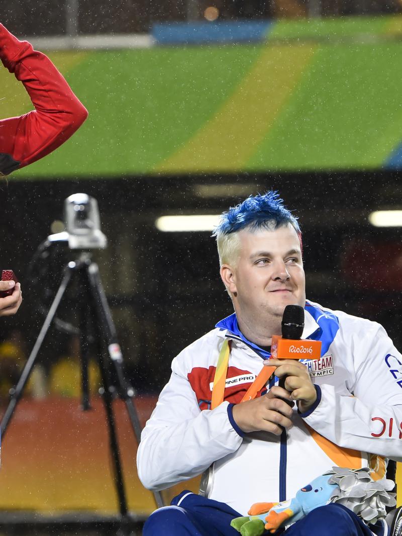 Silver medalist David Drahoninsky of the Czech Republic proposes to his girlfried Lida Fikarova after the medal ceremony for the men's individual archery W1 final atthe Rio 2016 Paralympic Games.