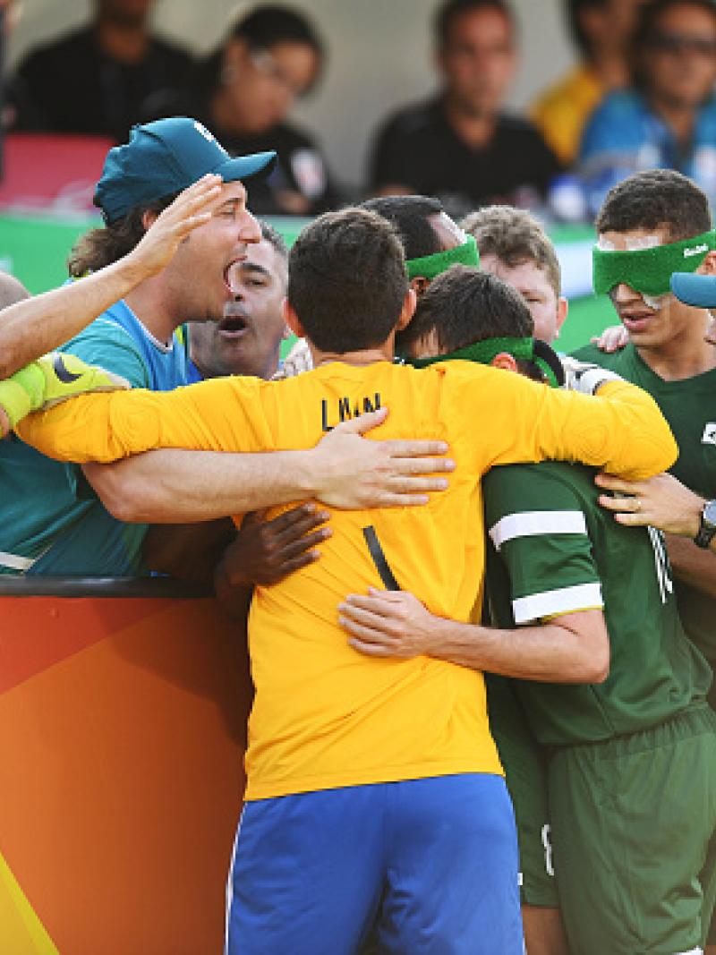 Ricardinho of Brazil and his team mates celebrate after scoring a goal in the men's football 5-a-side