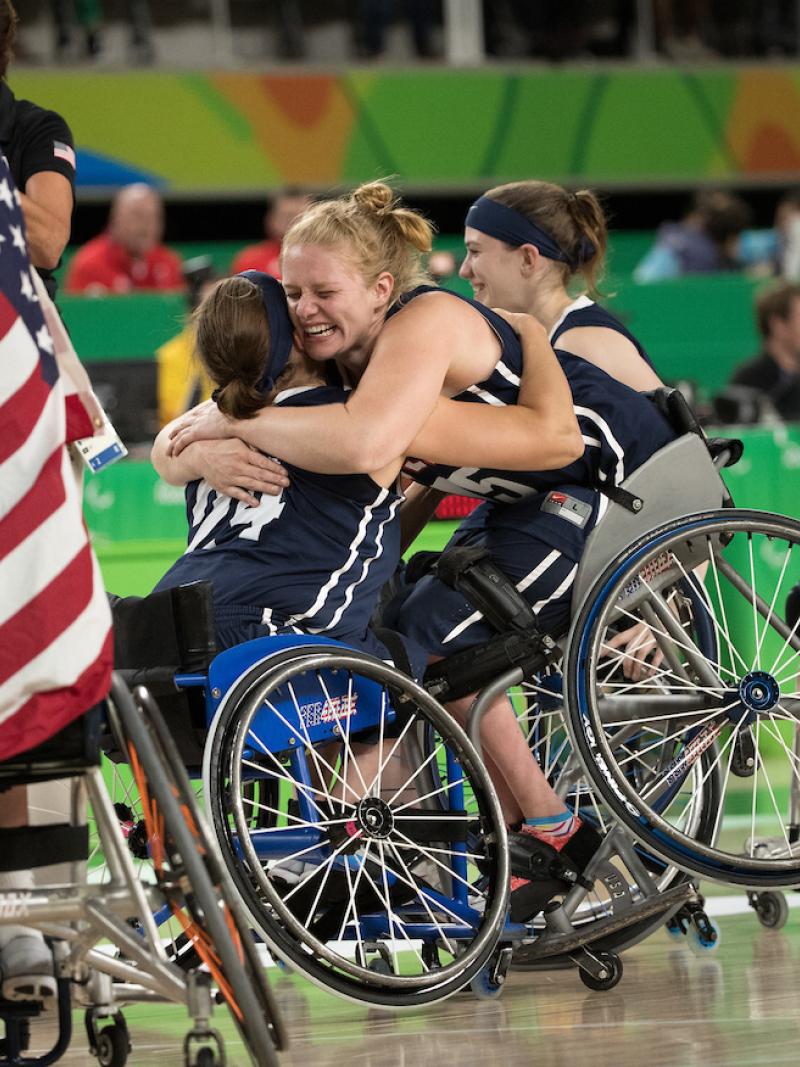 Christina Schwab USA (centre left) and Rose Hollermann USA (centre right) celebrate their team's victory 62 - 45 over Germany in the Wheelchair Basketball Women's Gold Medal Match