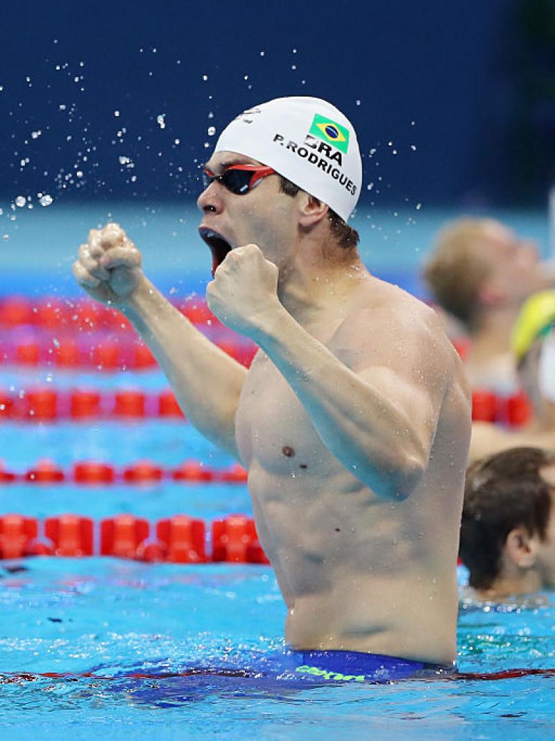 Brazilian swimmer Phelipe Rodrigues celebrating in the pool.
