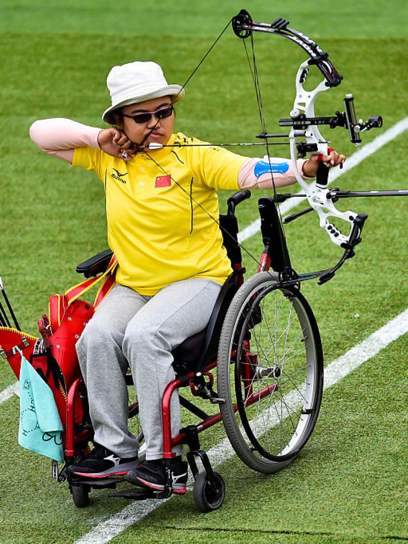 Man archer holds bow and arrows