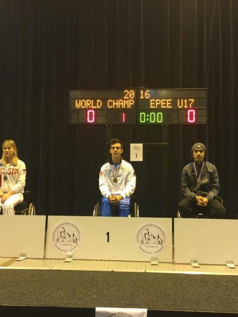Podium with three athletes in wheelchairs