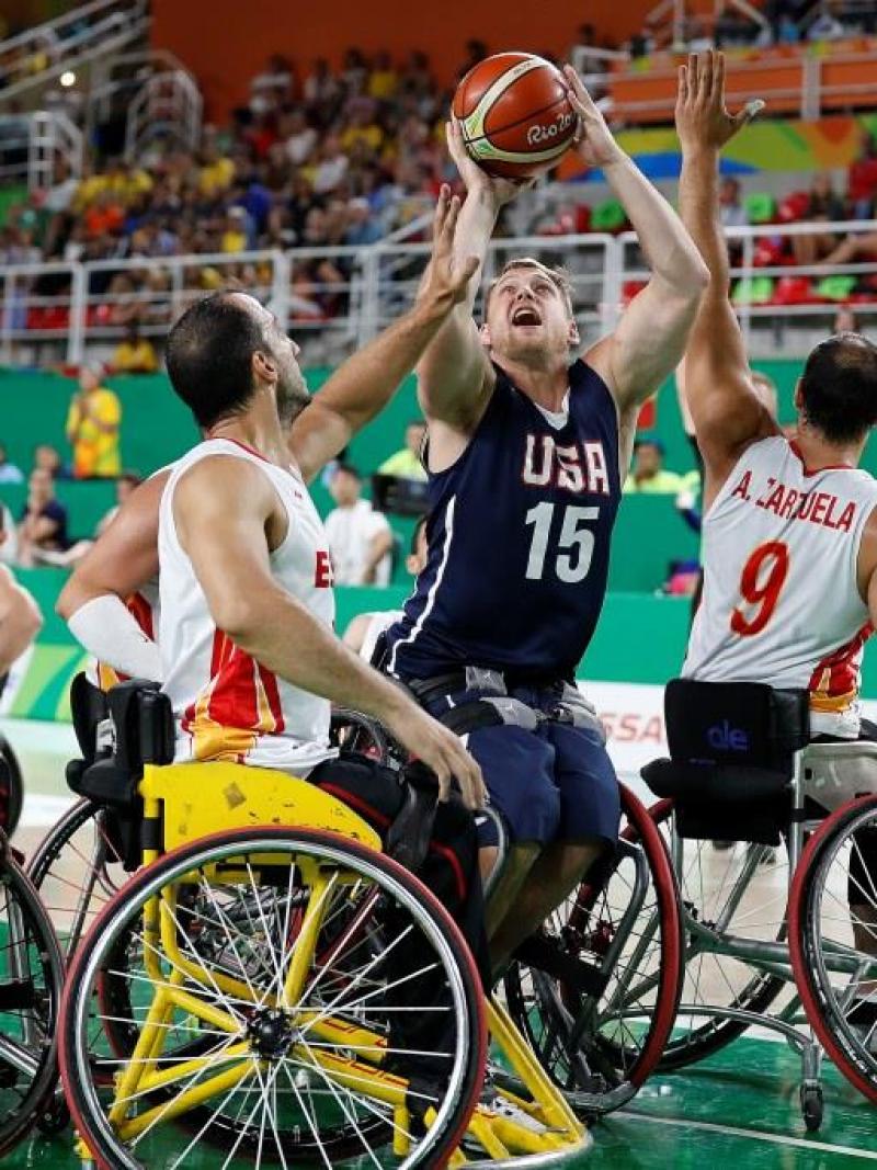 Athlete practicing wheelchair basketball.