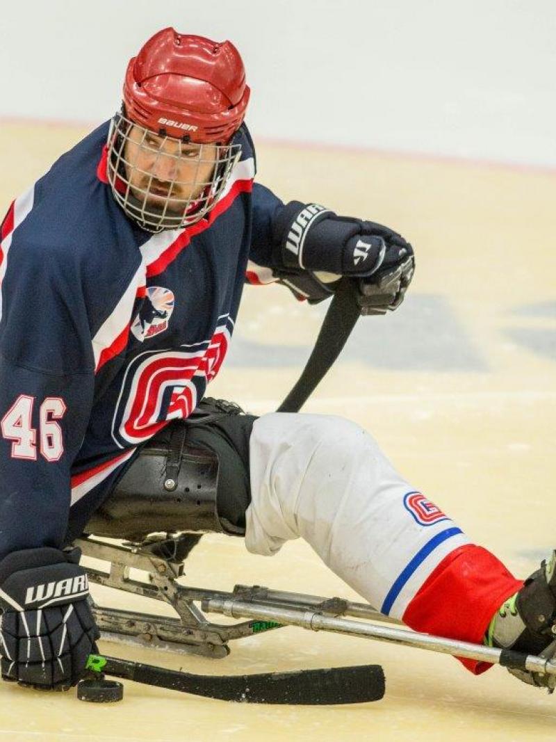 Darren Brown of Great Britain competes at the Ostersund 2015 IPC Ice Sledge Hockey World Championships B-Pool