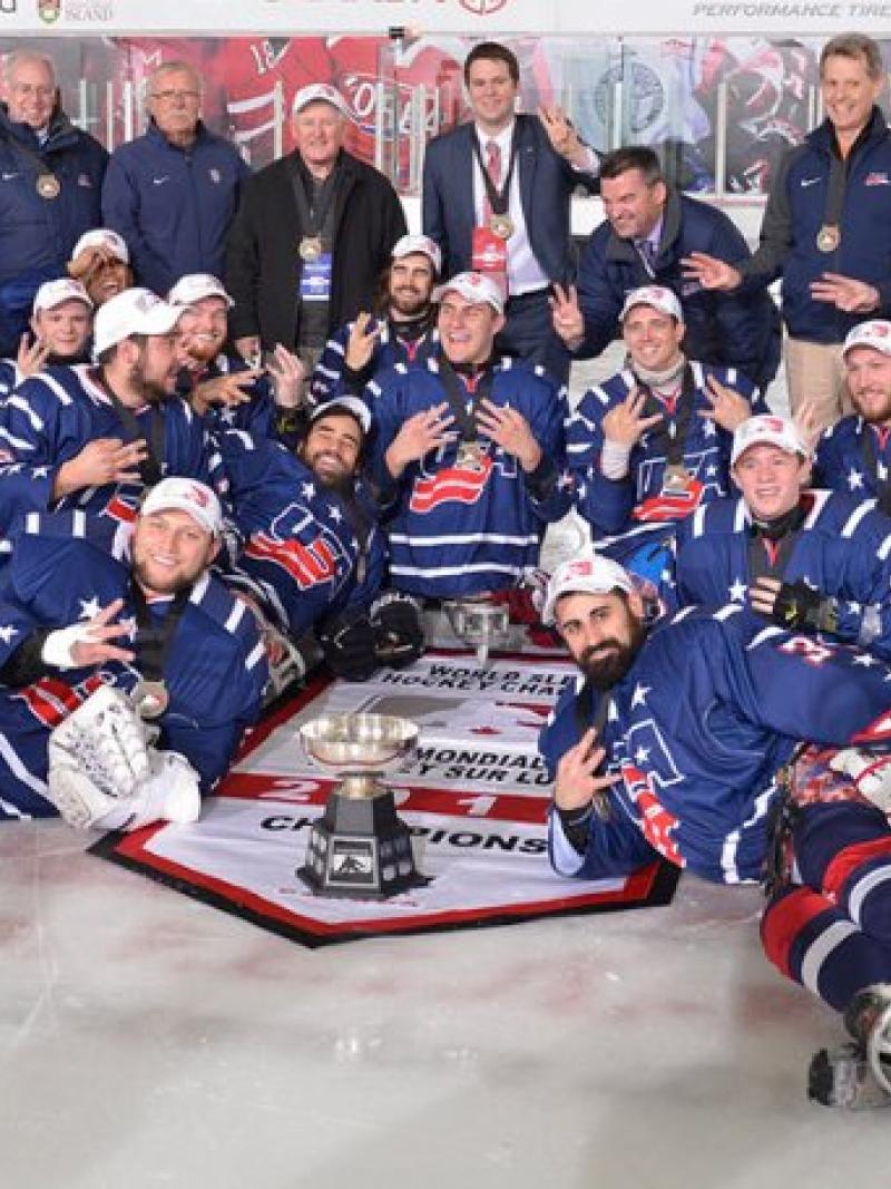 A Para ice hockey team celebrate their victory