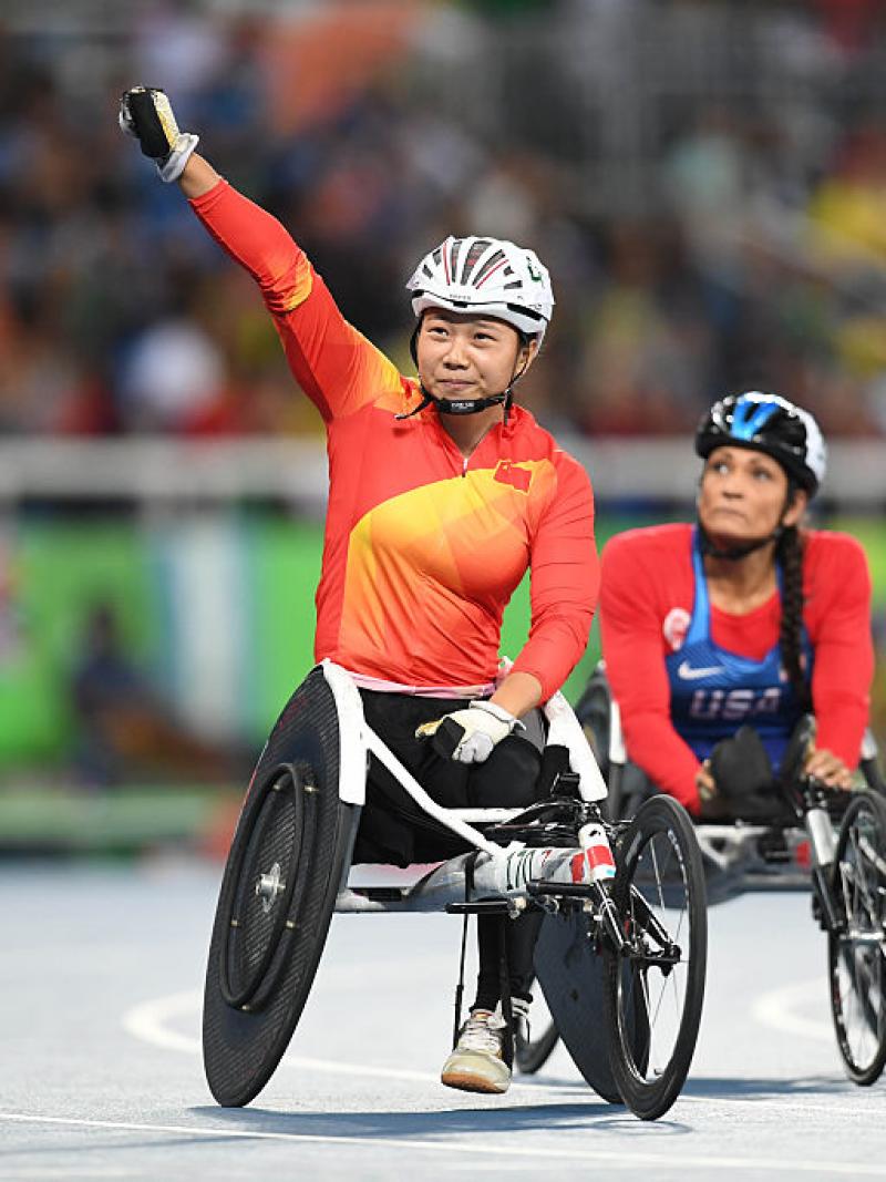 Wenjun Liu of China celebrates after winning the women's 100m - T54 final on day 2 of the Rio 2016 Paralympic Games