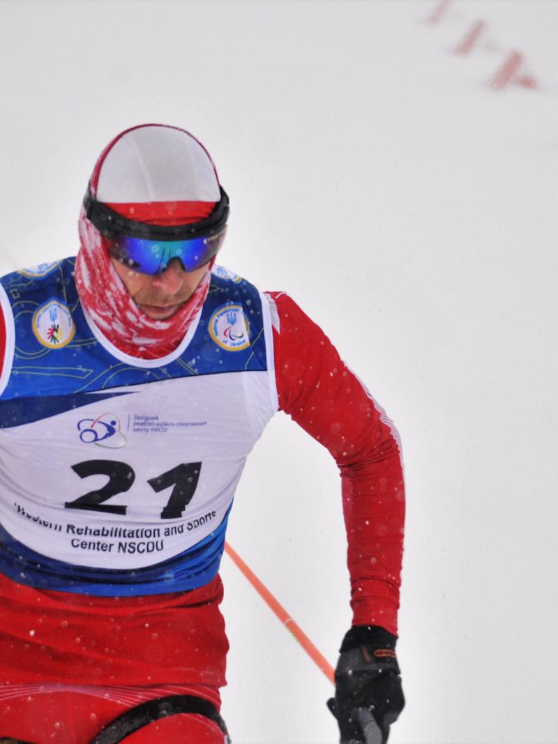 Man in sit ski on the slopes