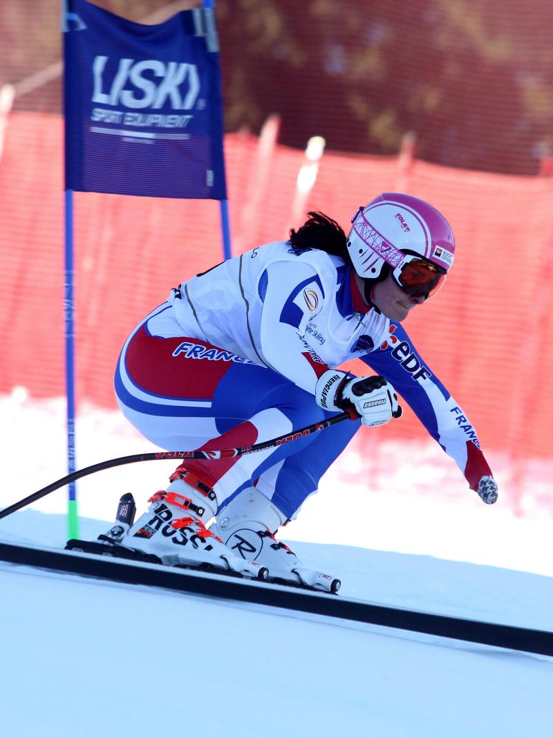 A skier competes in downhill