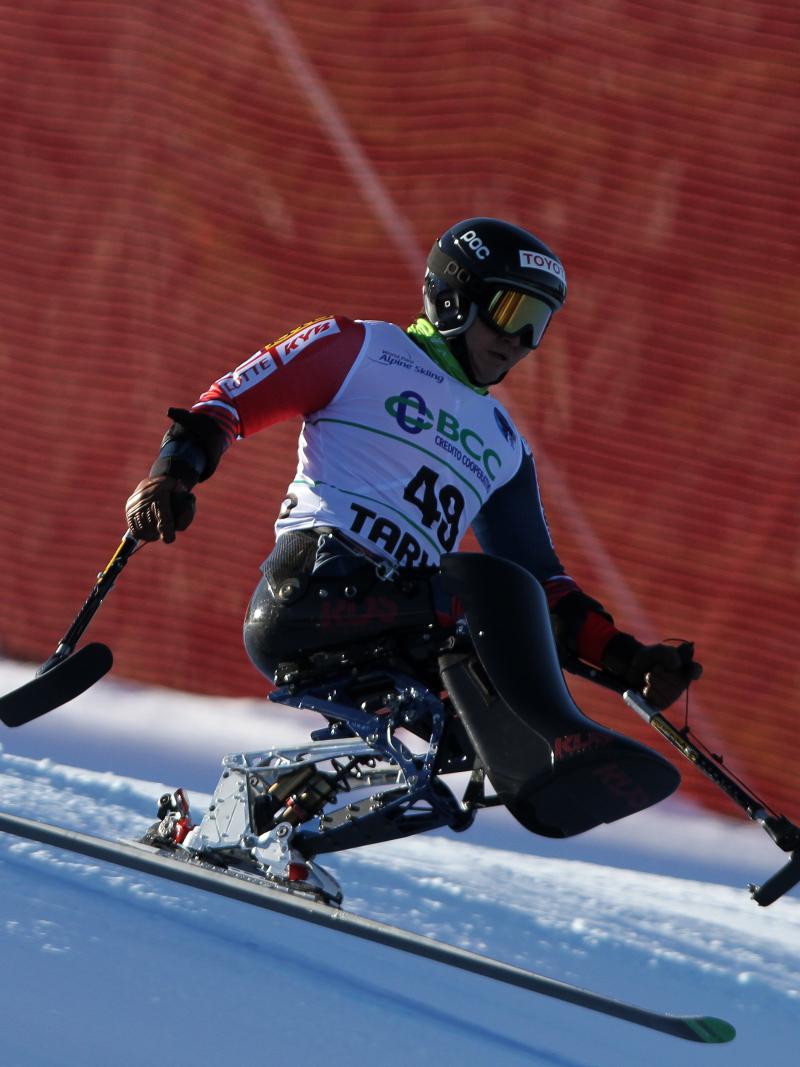 sit skier in action on a slope