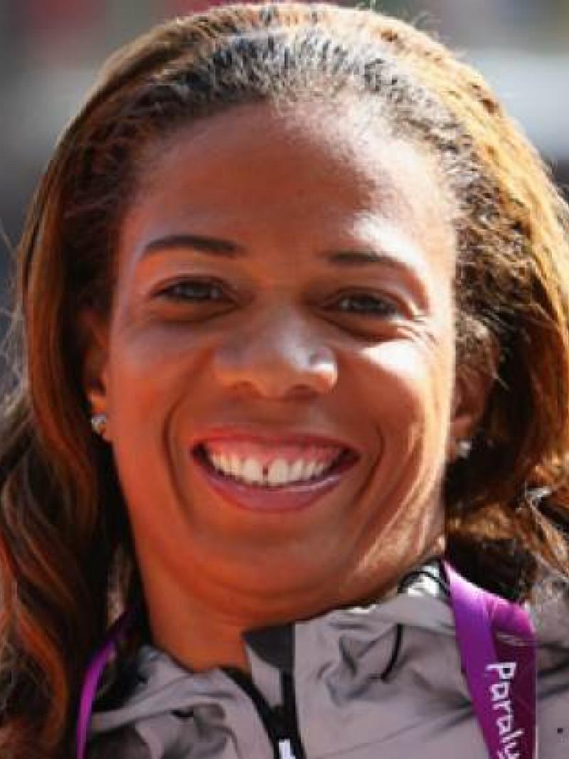 A picture of a woman's portrait showing her bronze medal