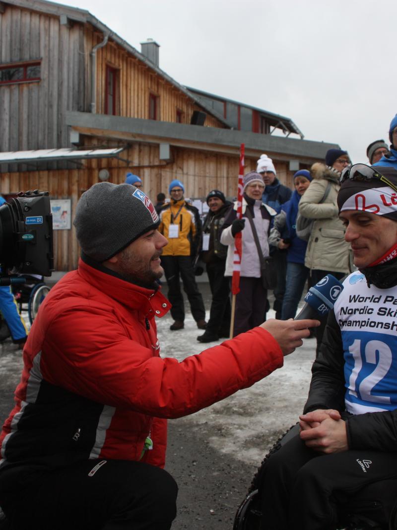 a para Nordic skier being interviewed