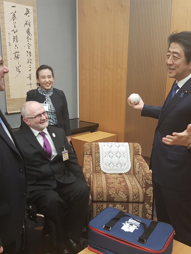 Japan's Prime Minister Abe chats with IPC President Sir Philip Craven and IPC CEO Xavier Gonzalez during a meeting in February 2017.