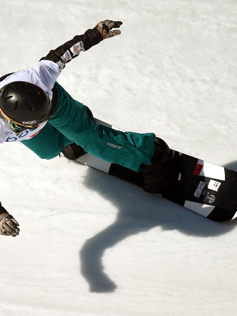 Woman on a snowboard in action